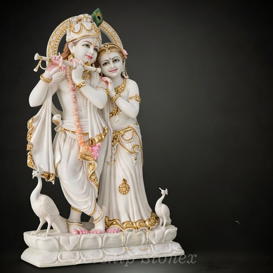 White Marble Radha Krishna Statue with Golden Work & Carved Peacocks