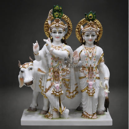 18 inch White Marble Radha Krishna Statue Set with Cow – Standing Pair Idol with Gold Work and Peacock Crests