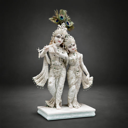 Pure White Makrana Marble Standing Radha Krishna Statue – Divine Yugal Jodi Idol with Emerald & Pearl Ornamentation (Available in Sizes 12 to 36 Inches)