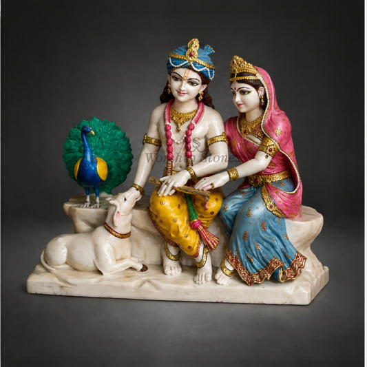 18 Inch makrana White Marble Seated Radha Krishna Statue – Divine Sitting Pair Idol with Cow and Peacock