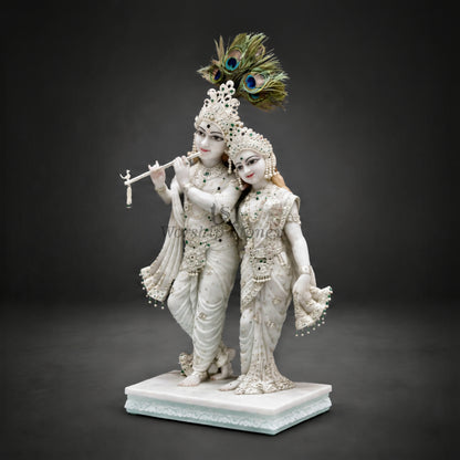 Pure White Makrana Marble Standing Radha Krishna Statue – Divine Yugal Jodi Idol with Emerald & Pearl Ornamentation (Available in Sizes 12 to 36 Inches)