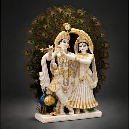 30 Inch Handcrafted Vietnam White Marble Radha Krishna Statue – Standing Pair Idol with Gold Ornamentation and Peacock Feather Backdrop